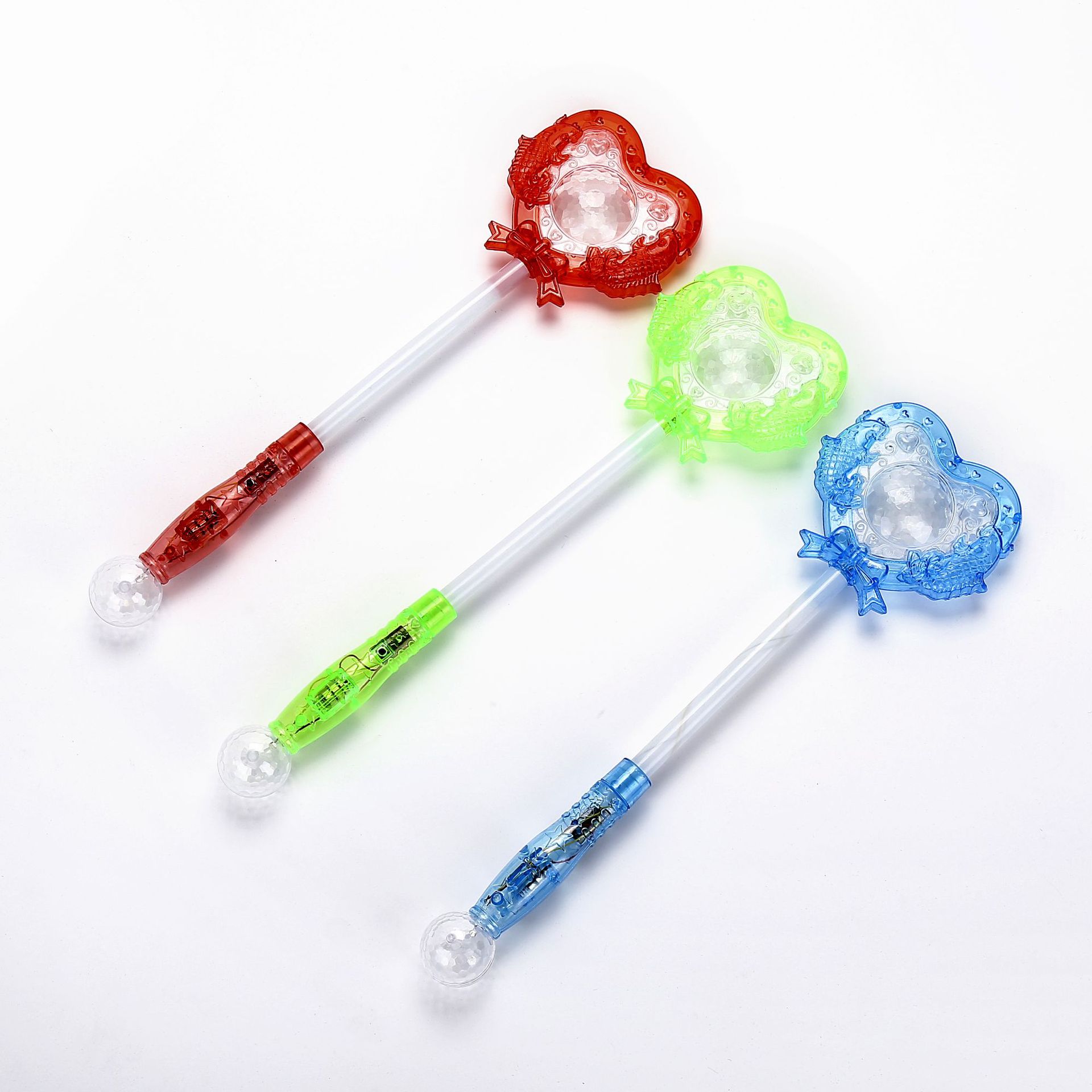 4 ASST COL 39.5CM HEART LIGHT UP WAND IN POLYBAG W/HEADER CD