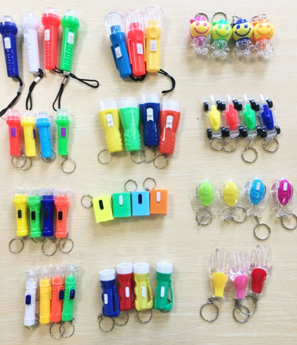 12ASST LIGHT-UP NOVELTY KEYCHAINS BULK PACKED 48 PCS